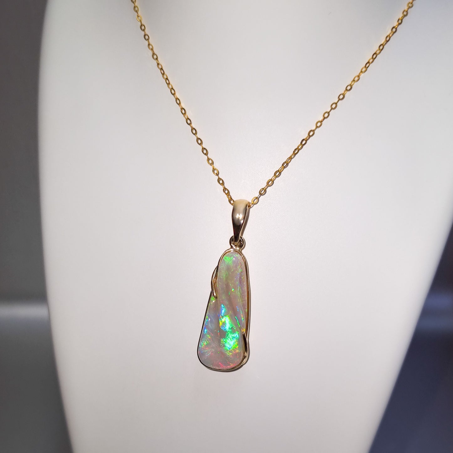 Solid Carved Opal Gold Pendant