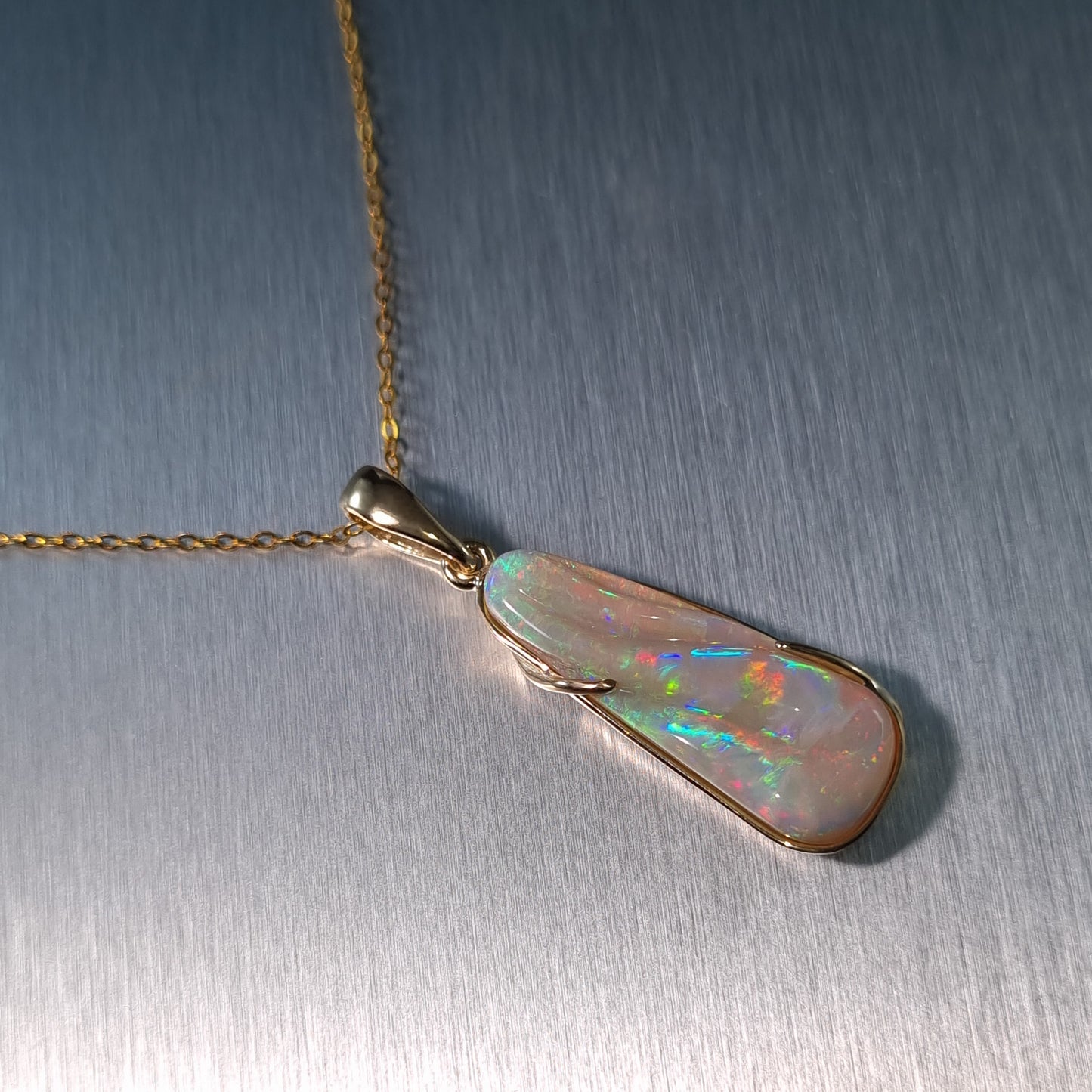 Solid Carved Opal Gold Pendant