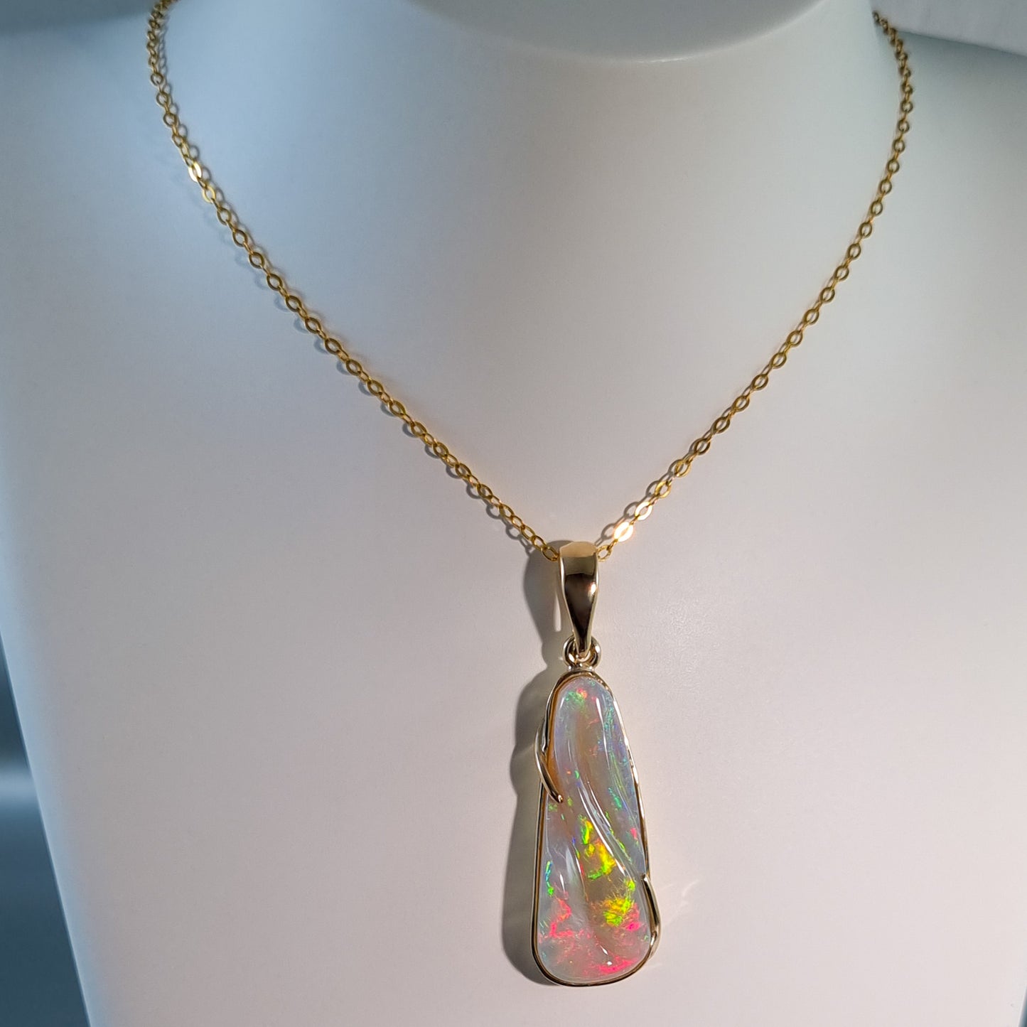 Solid Carved Opal Gold Pendant