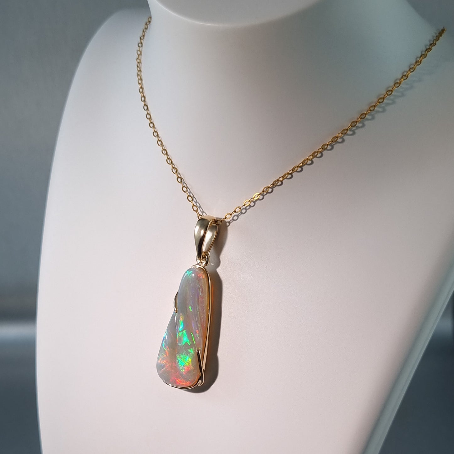 Solid Carved Opal Gold Pendant