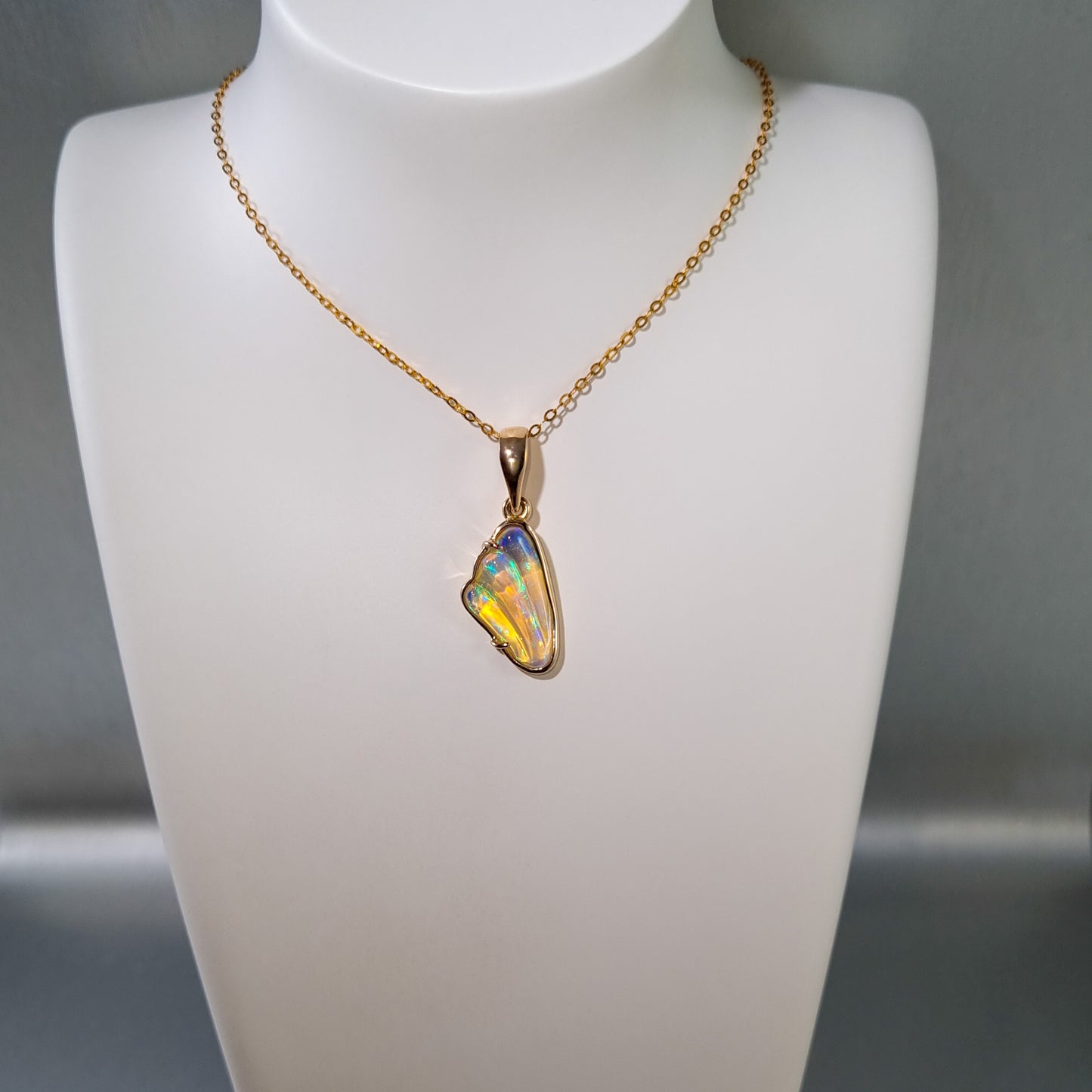 Solid Carved Opal Gold Pendant