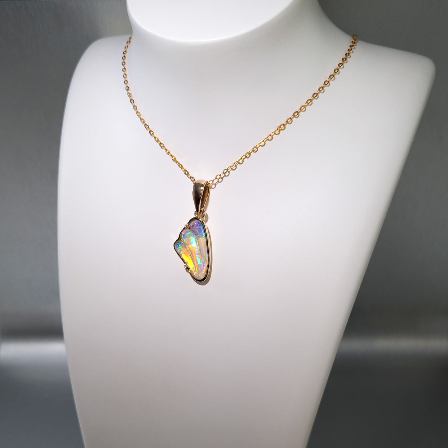 Solid Carved Opal Gold Pendant