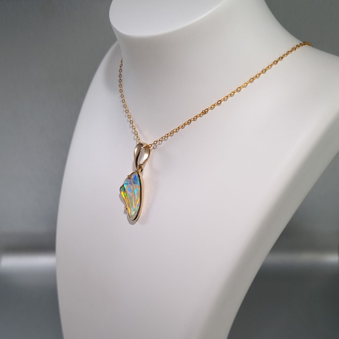 Solid Carved Opal Gold Pendant