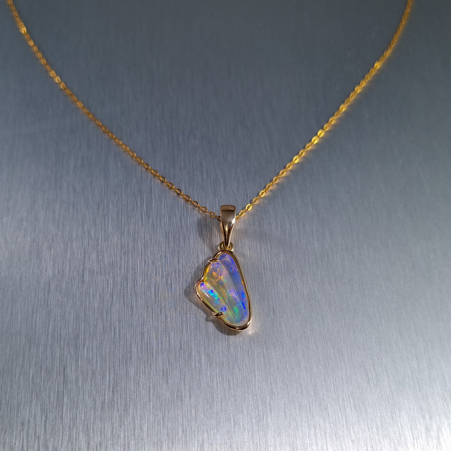 Solid Carved Opal Gold Pendant