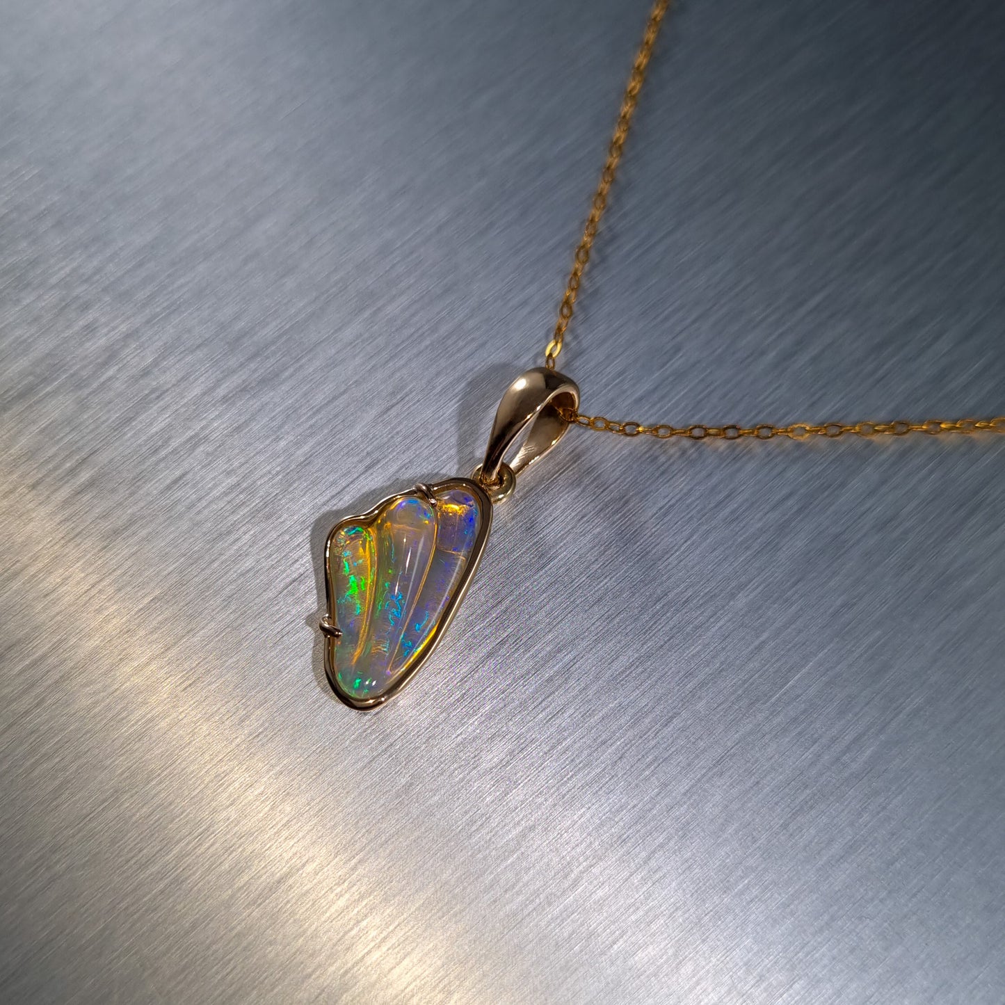 Solid Carved Opal Gold Pendant