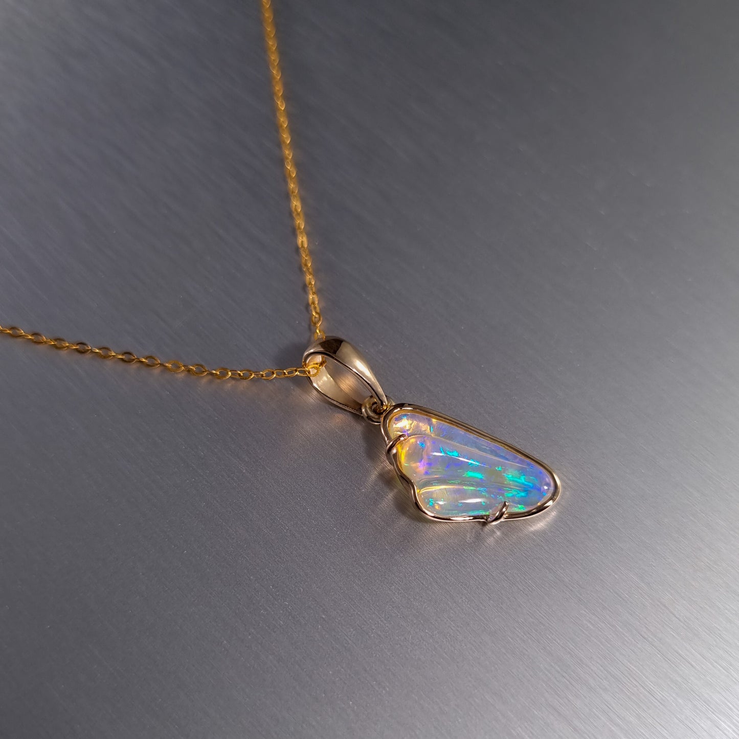 Solid Carved Opal Gold Pendant